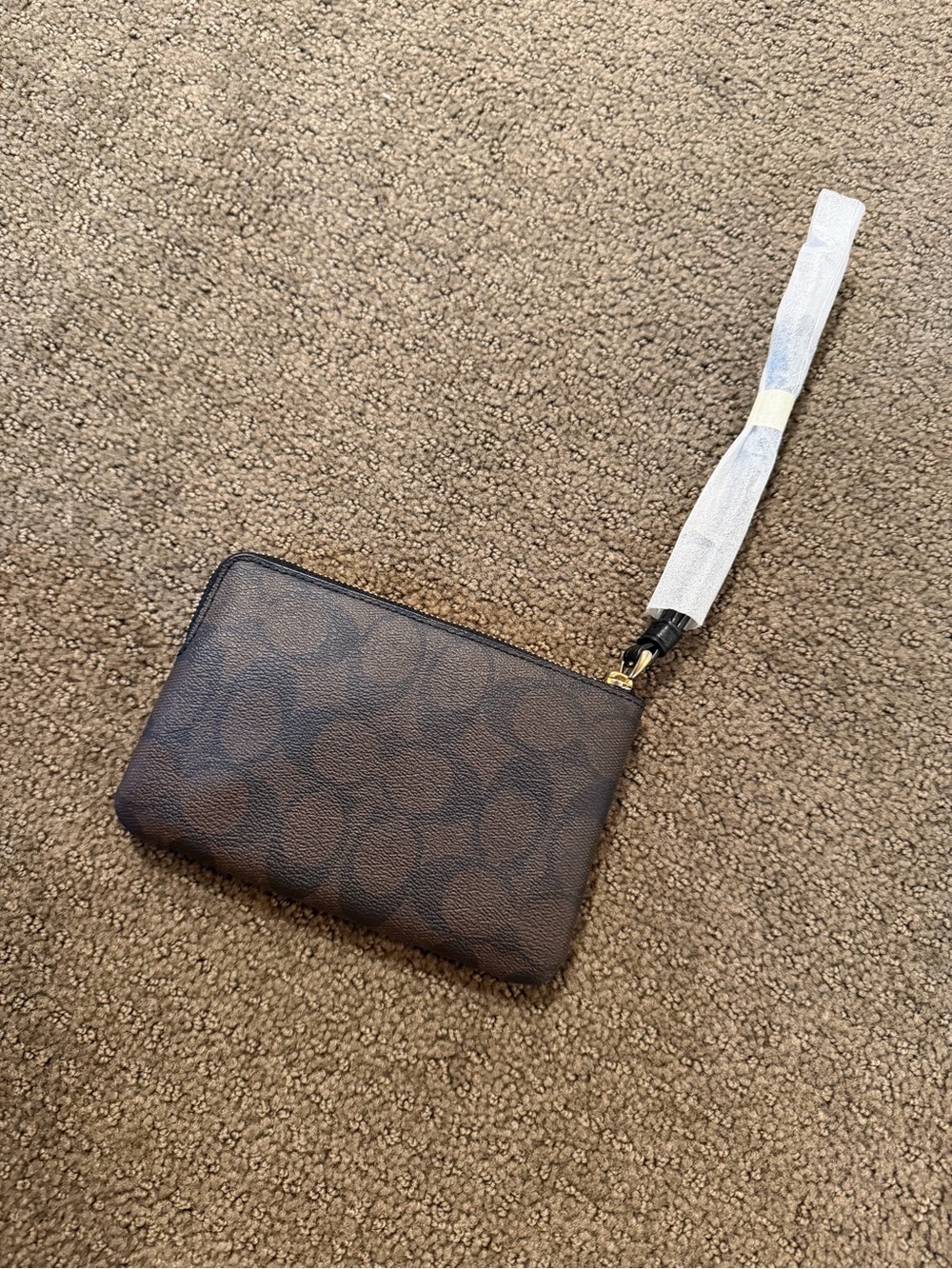 Coach Brown Signature Canvas Wristlet with Black Center Stripe - Picture 2 of 3